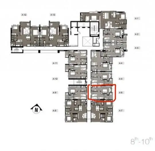Detailed floor plan of a modern apartment building with highlighted unit.