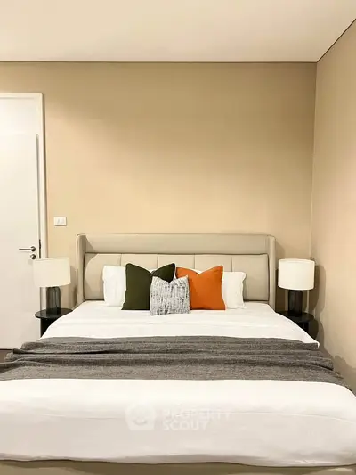 Modern bedroom with stylish decor and cozy ambiance