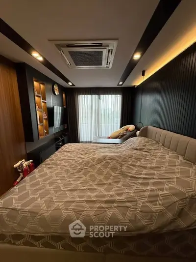 Luxurious modern bedroom with stylish decor and ambient lighting