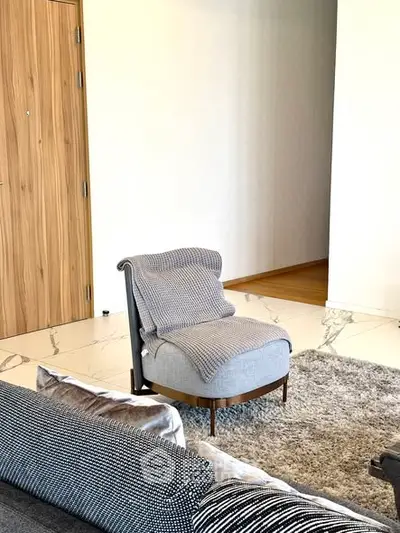 Stylish modern living room with cozy seating and elegant decor