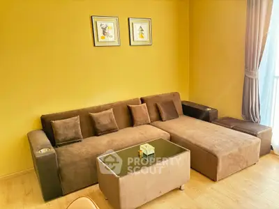Cozy living room with brown sectional sofa and modern decor