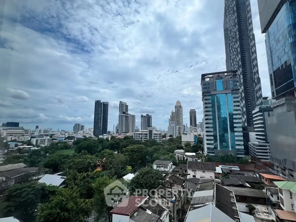 Stunning cityscape view with modern skyscrapers and lush greenery, perfect for urban living enthusiasts.