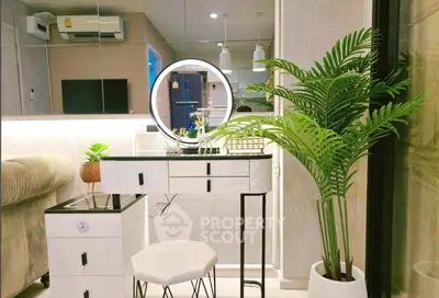 Chic modern living room with stylish vanity and lush indoor plant