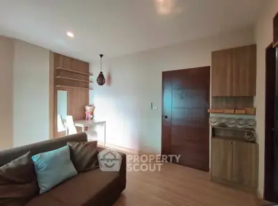 Modern living room with stylish decor and cozy seating area