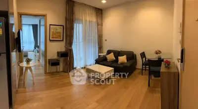 Spacious modern living room with wooden flooring and elegant decor