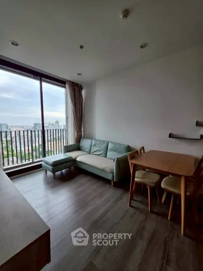 Modern living room with city view and stylish furniture