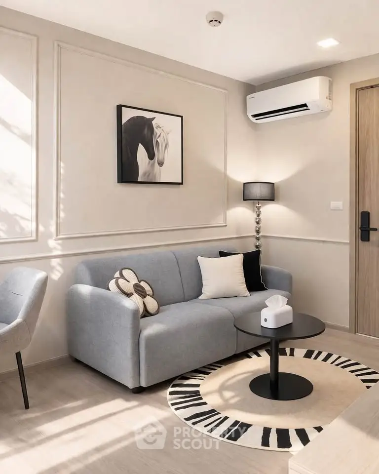 Modern living room with stylish decor and air conditioning