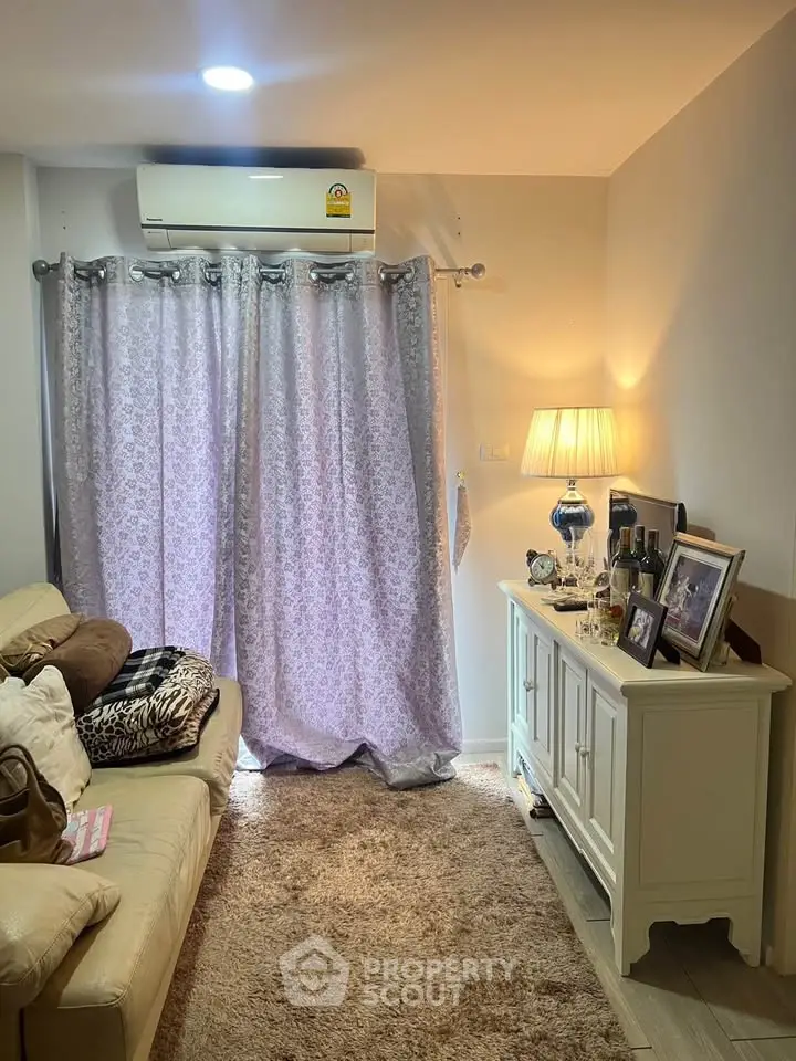 Cozy living room with elegant decor and soft lighting