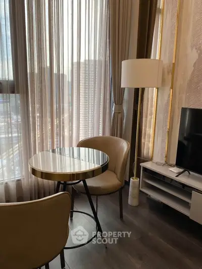 Chic modern living room with elegant furniture and city view