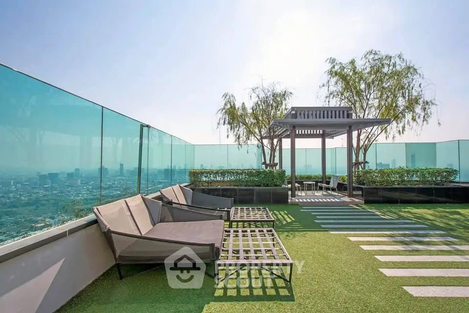 Luxurious rooftop garden with panoramic city views and modern seating area.