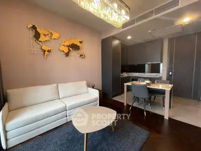Modern living room with elegant decor and open kitchen layout