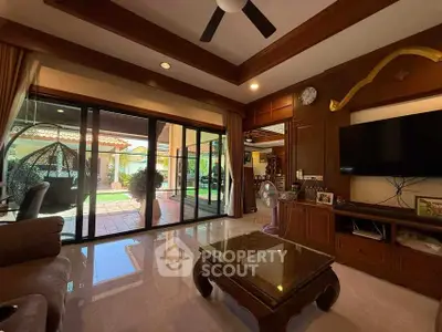 Spacious living room with garden view and modern decor