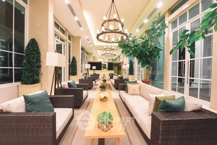 Luxurious modern living room with elegant seating and lush greenery