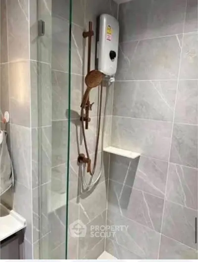 Modern bathroom with sleek shower and elegant tile design