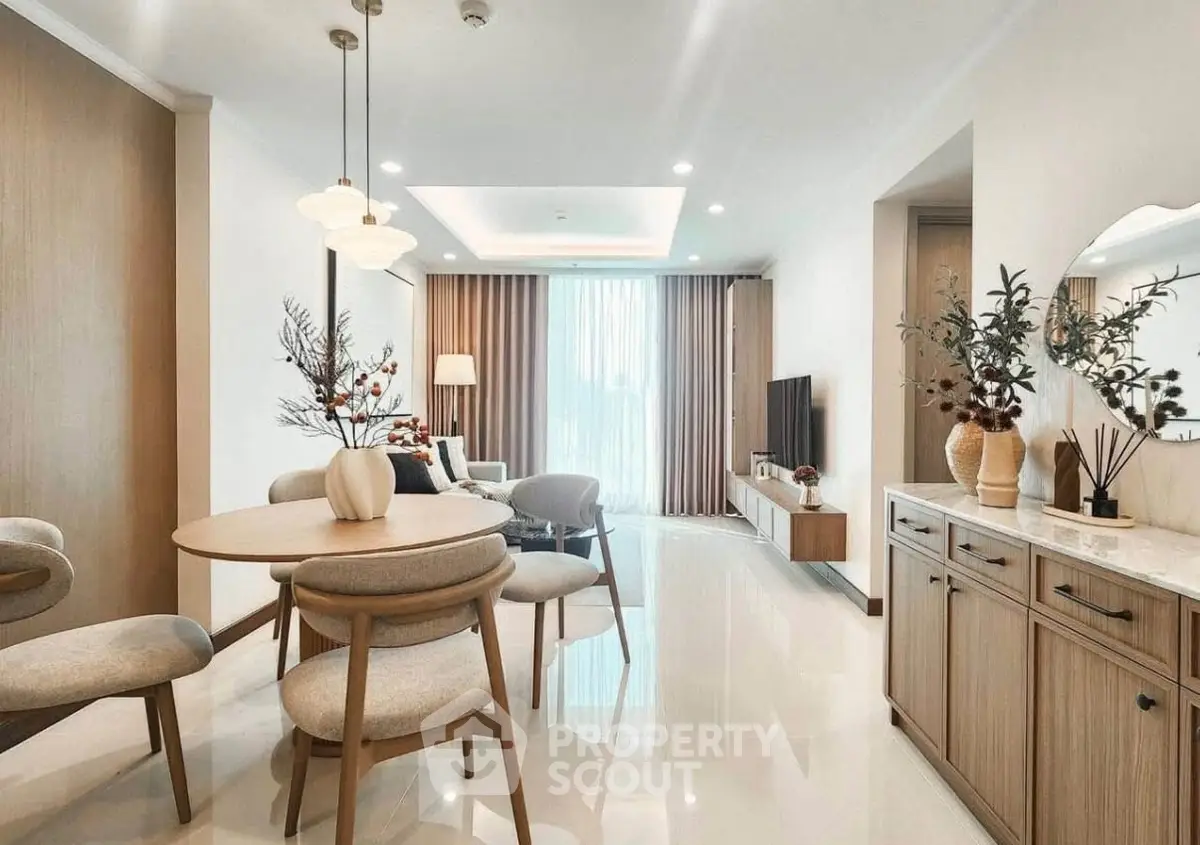 Modern living room with elegant dining area and stylish decor