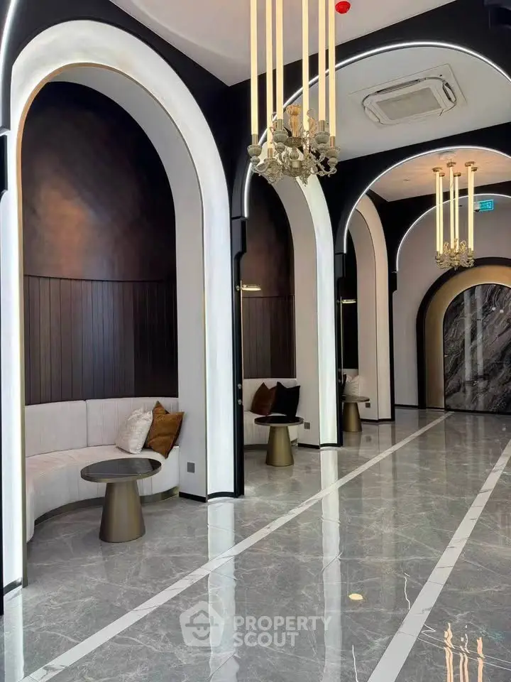 Luxurious modern lobby with elegant arches and chic seating area