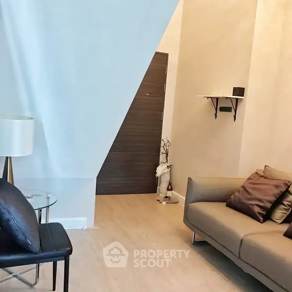 Modern living room with stylish decor and cozy seating area