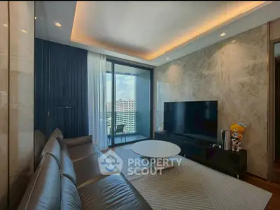 Luxurious living room with modern decor and city view balcony