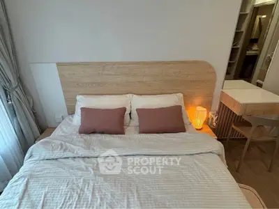 Cozy bedroom with stylish wooden headboard and soft lighting