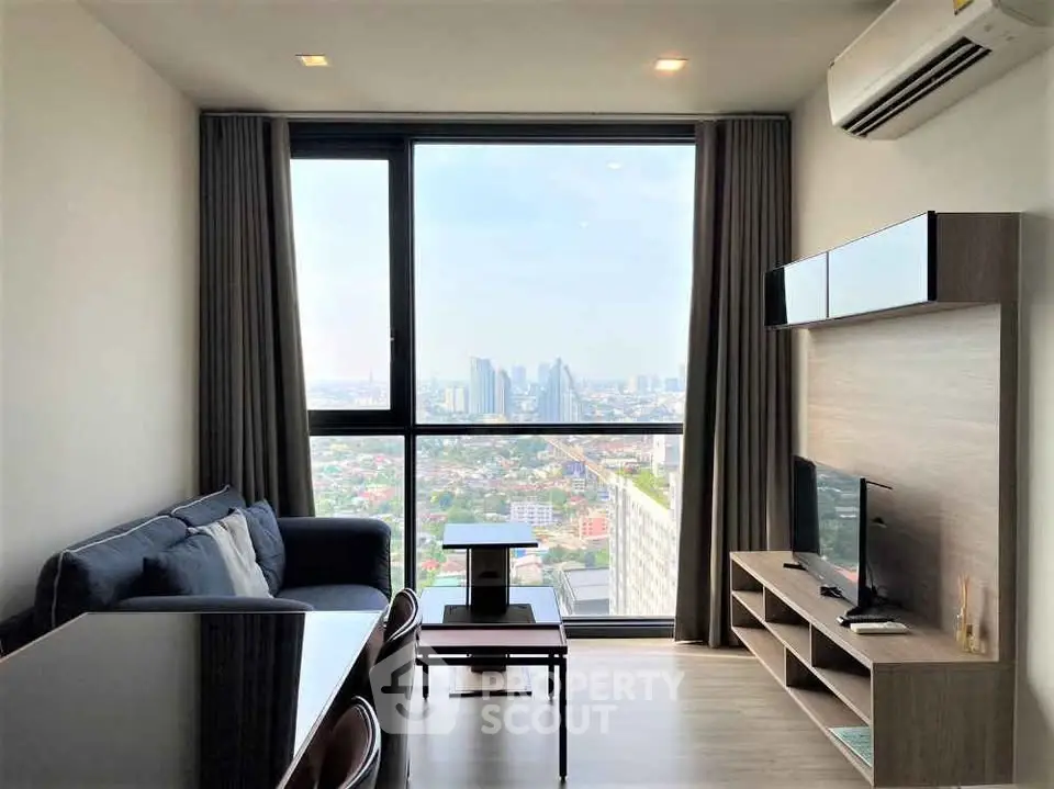 Modern living room with stunning city view and sleek furniture