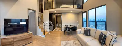 Modern duplex living room with mezzanine and city view