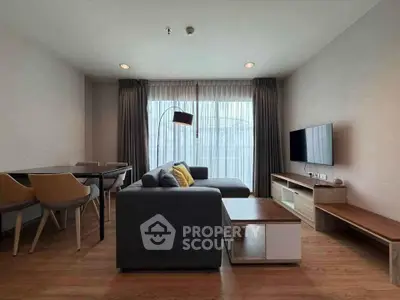 Modern living room with stylish furniture and natural light