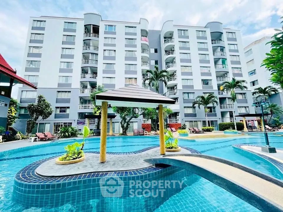 Luxurious condominium with stunning pool and modern architecture, perfect for resort-style living.