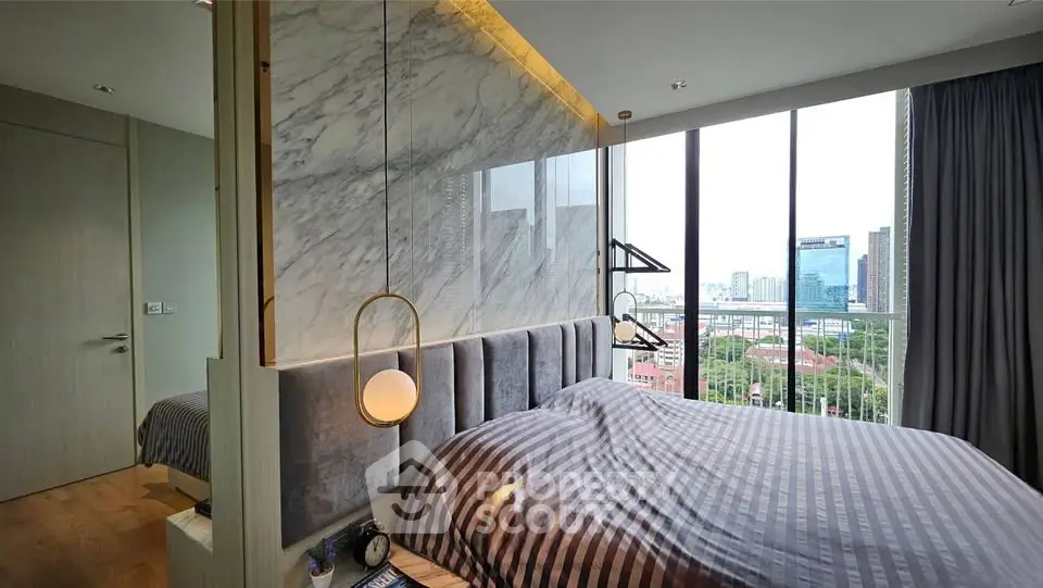 Luxurious bedroom with city view and modern design in high-rise apartment