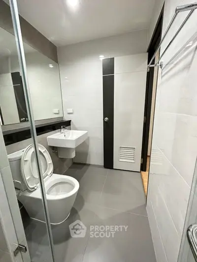 Modern bathroom with sleek design and glass shower enclosure