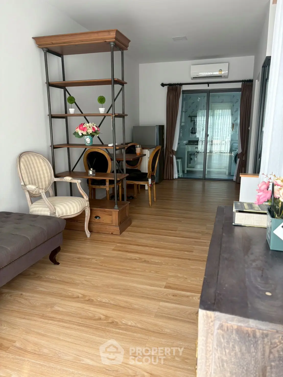 Charming living room with elegant furniture and wooden flooring