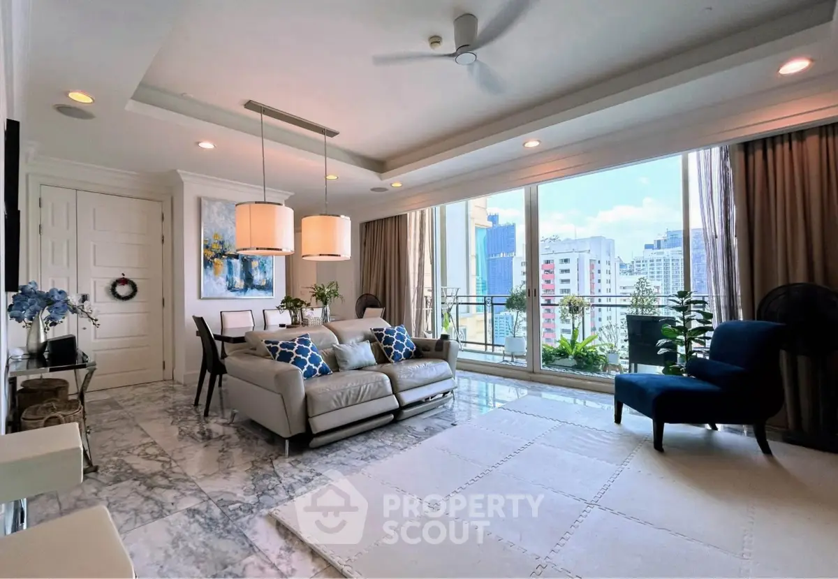 Luxurious living room with marble floors and city view balcony in modern apartment