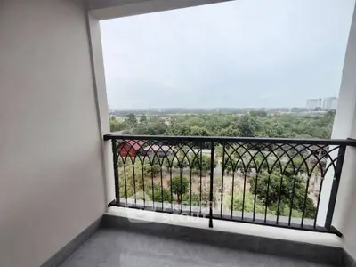 Spacious balcony with stunning green view in modern apartment