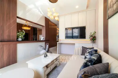 Luxurious modern living room with elegant decor and ambient lighting