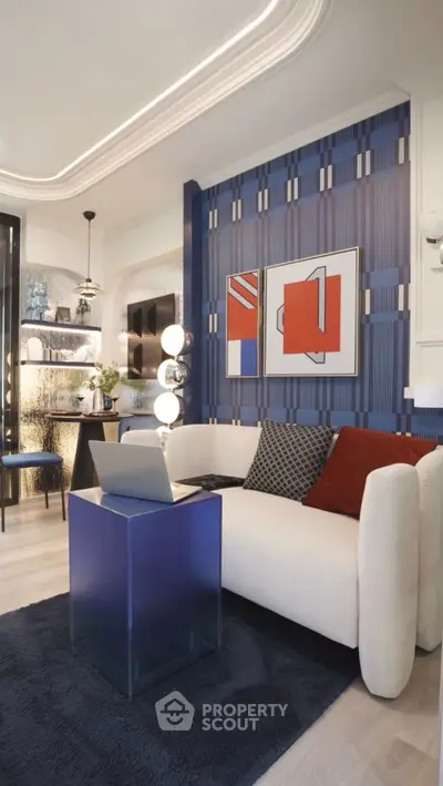 Modern living room with stylish decor and vibrant artwork, featuring a cozy sofa and sleek blue side table.