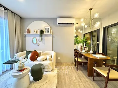 Stylish modern living room with elegant dining area and chic decor
