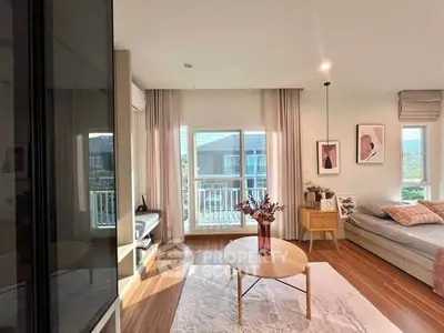 Bright and airy living room with modern decor and large windows