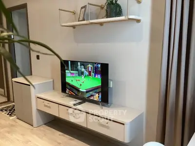 Modern living room with sleek TV unit and stylish decor