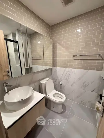 Modern bathroom with stylish tiles and sleek fixtures