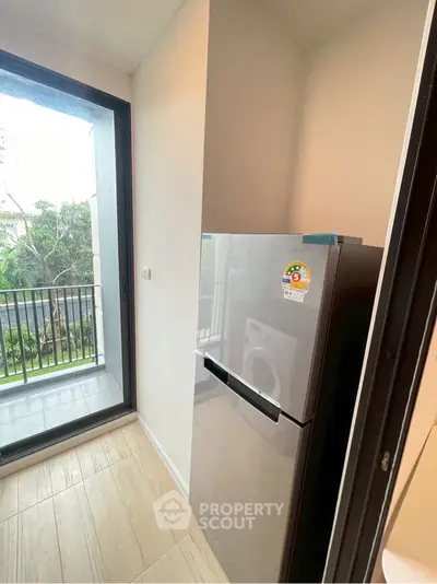 Spacious balcony with modern railing and scenic view