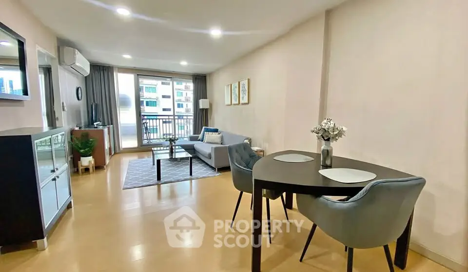 Spacious modern living room with balcony and stylish decor