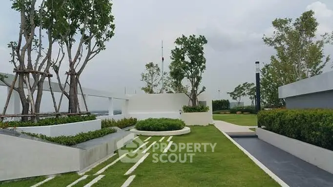 Luxurious rooftop garden with modern landscaping and scenic views.