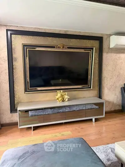 Luxurious living room with elegant TV setup and stylish decor