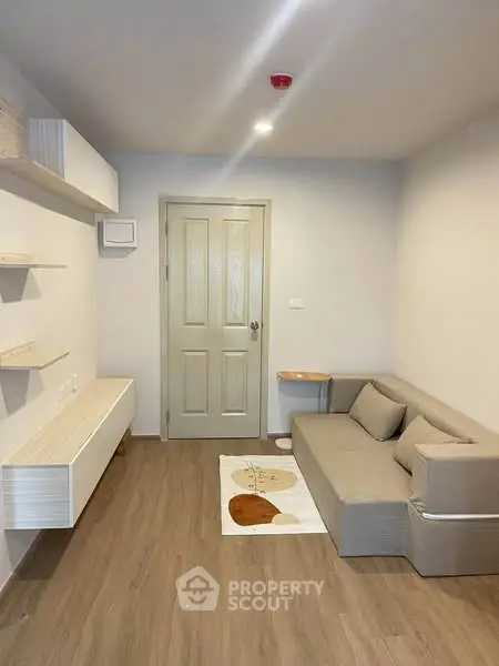 Modern living room with minimalist design and cozy sofa