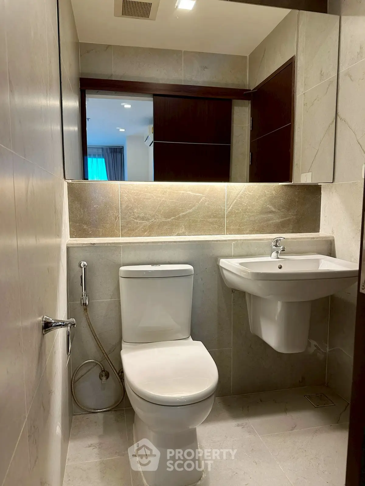 Modern bathroom with sleek fixtures and neutral tones