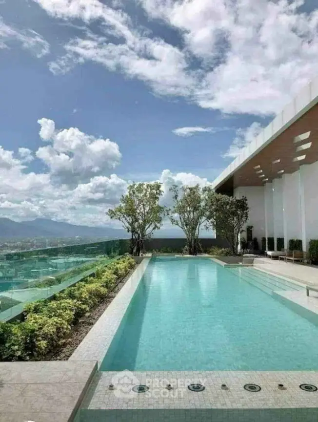Luxurious rooftop pool with stunning mountain views and modern design.