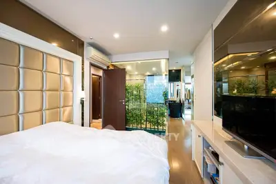 Luxurious modern bedroom with elegant decor and spacious layout