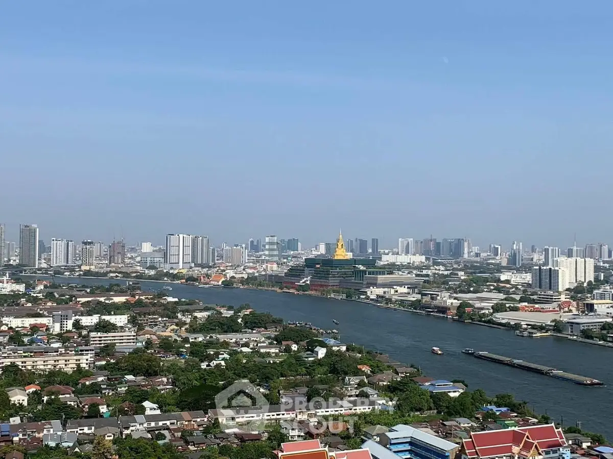 Stunning cityscape view with river and skyline, perfect for urban living enthusiasts.