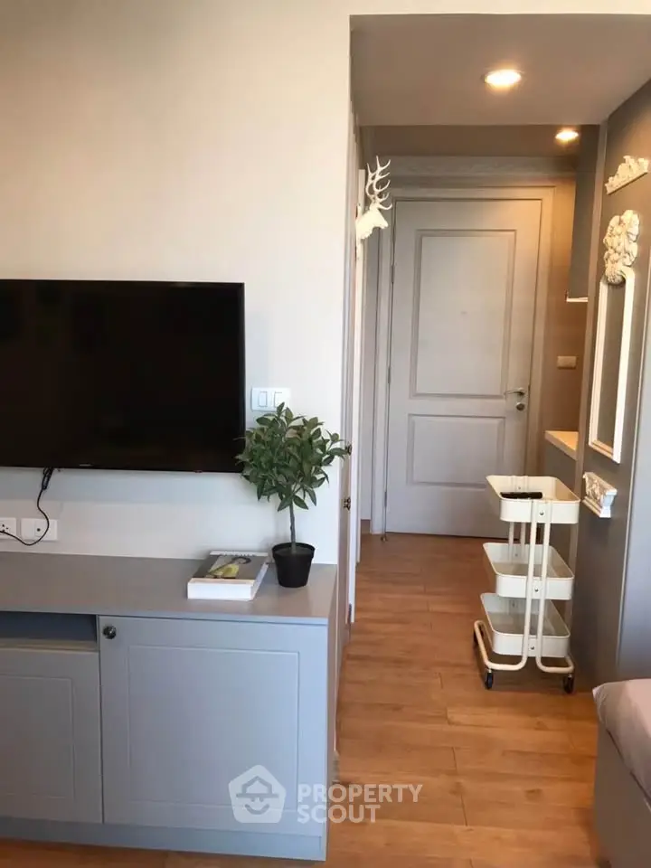 Modern living room with sleek TV setup and stylish decor