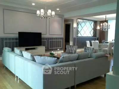 Spacious living room with elegant decor and large sectional sofa