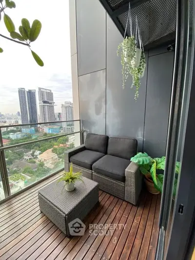 Stylish balcony with city view, featuring cozy seating and lush greenery for a perfect urban retreat.